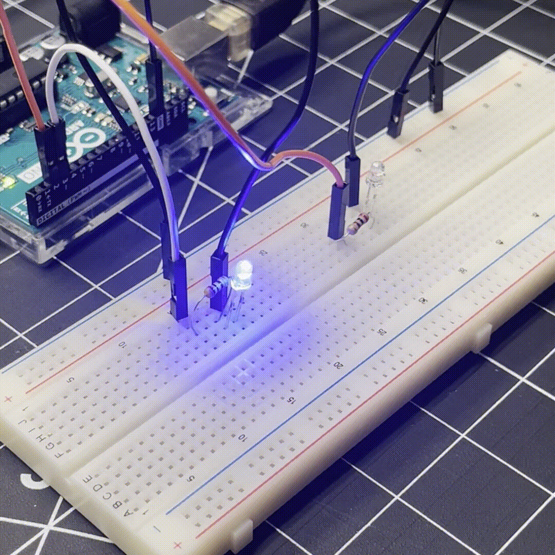 We then replaced the button with a second LED light. Then we changed the flicker speed so the lights would go off at different intervals. 