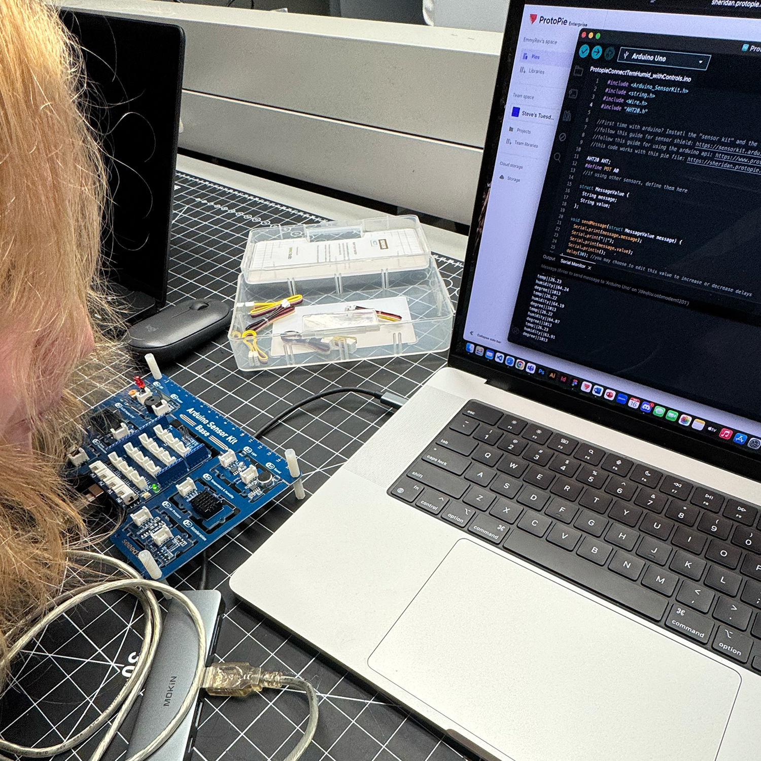 The other portion of the sensor board included a humiditiy sensor. This photo is me blowing hot air on the sensor to change the number value on the prototype and the code.
