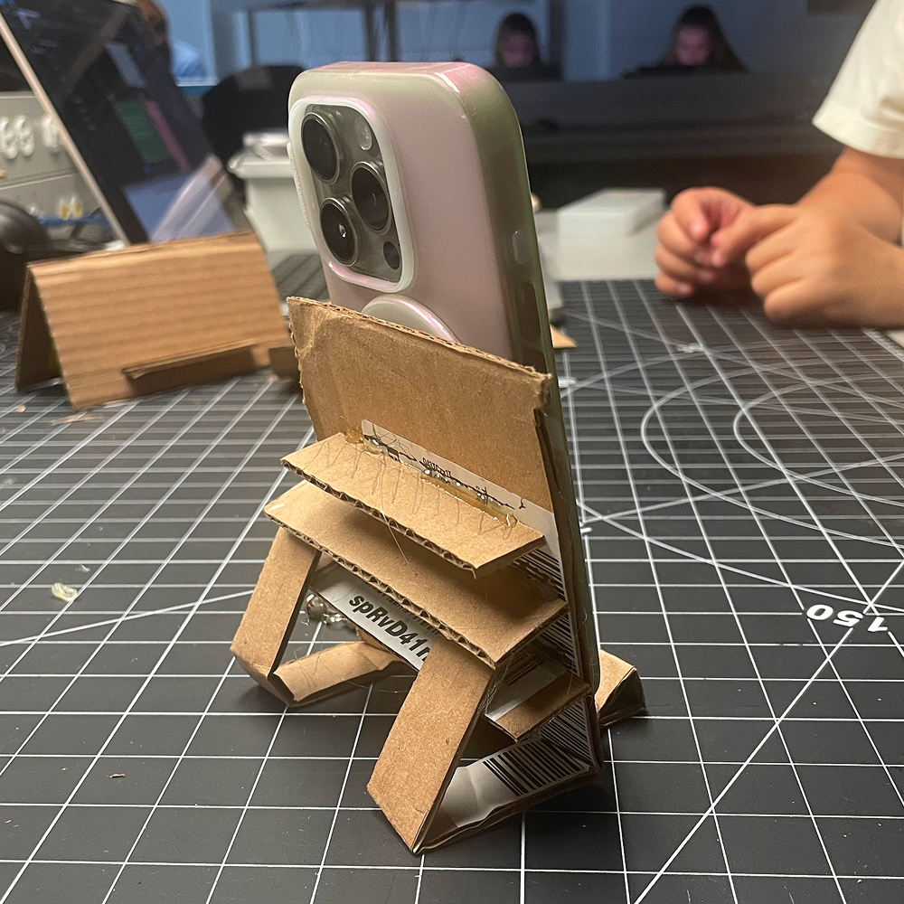 This is the second phone case finished. It has several layers of cardboard on the back to give the user more adjustability for screen angles.